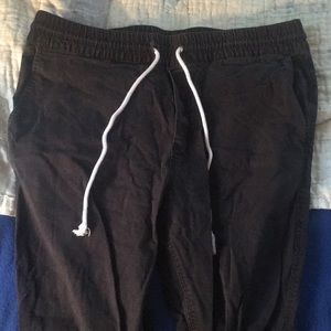 Black skinny joggers with zip up ankles